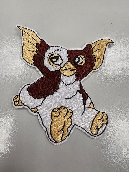 Patches - Gizmo sitting